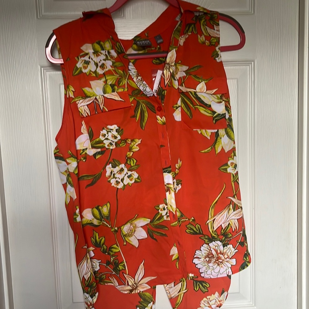 NY & Company button down blouse with tags. Nice flowing design.